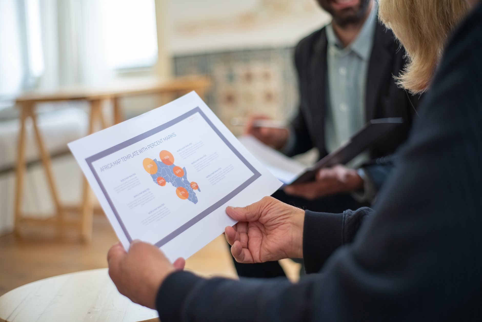 StratApps consultants reviewing a data strategy and project scope with a client team
